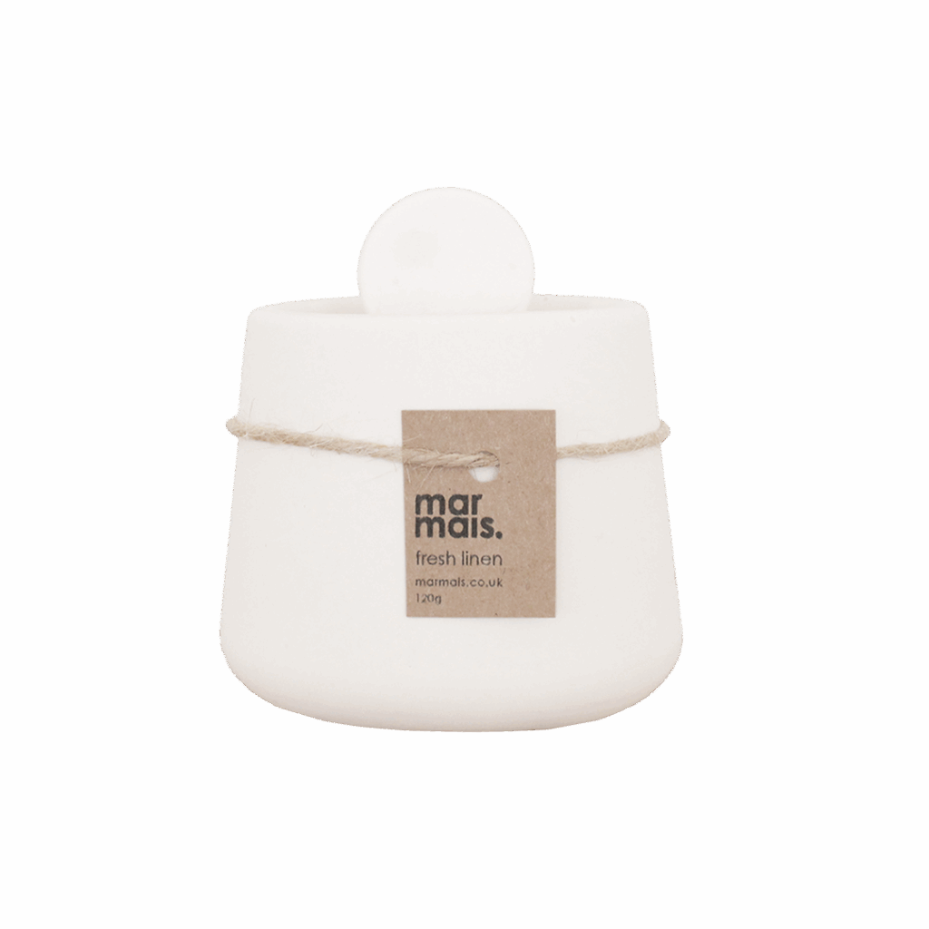 Fresh Linen candle by Marmais in a handmade white ceramic vessel with lid, filled with natural rapeseed and coconut wax for a clean, crisp home fragrance.