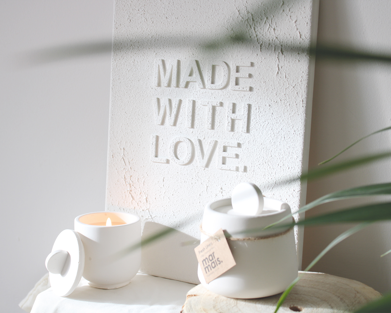 Showcasing new candle as well as Fresh Linen Scented Candle. Handmade canvas wall art in background. Netural tones and gifting ideas