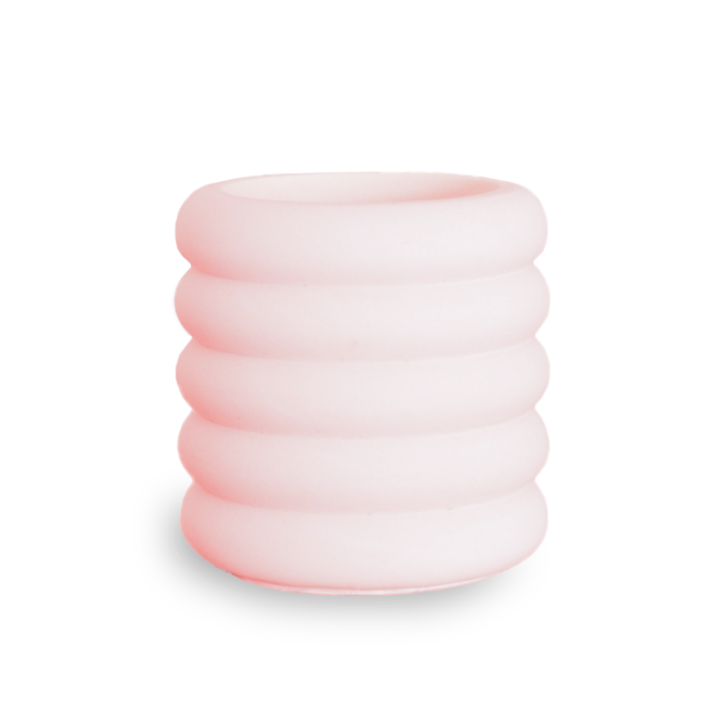 Rise Snow Angel scented candle by Marmais with soft pink glow and minimalist design