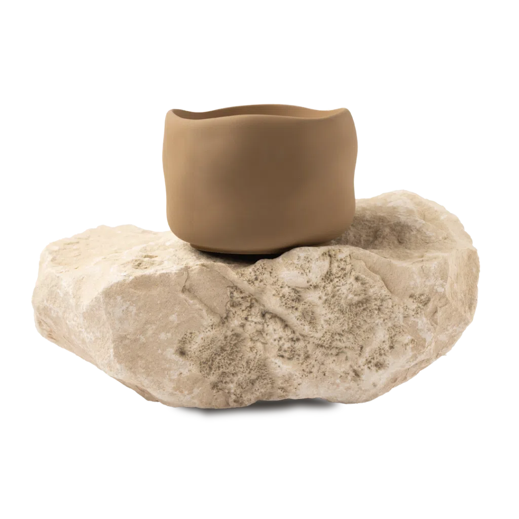 Maple & Pecan brown handmade candle in a natural Jesmonite vessel